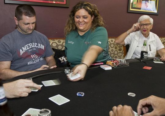 Heather Schneck one-armed poker dealer