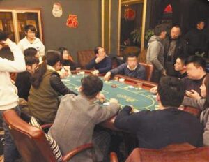 Poker club hides illegal gambling den in China.