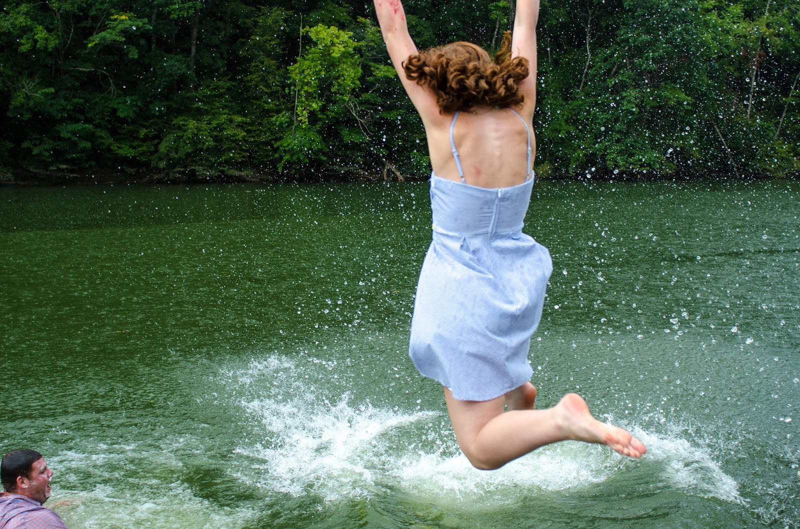 jumping in a river