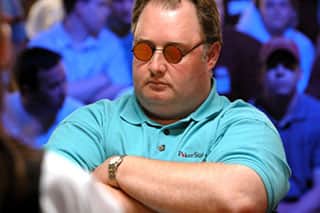Greg Raymer - 'Fossilman' - in his trademark sunglasses at the poker table