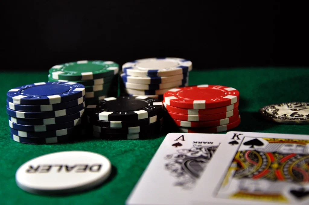 Poker chips and cards to depict continuation betting